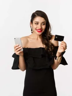 A woman using her Discover it Secured Credit Card.