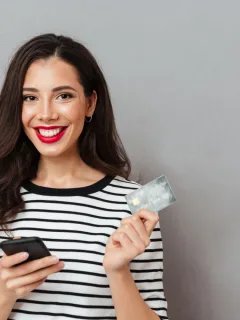 A girl using her Wells Fargo Active Cash Card.