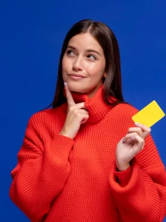 A girl holding her Petal 2 Visa.