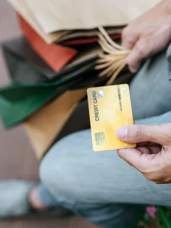 A persona using the Petal 2 Visa card for shopping.