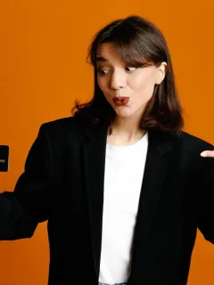A woman using her Citi Diamond Preferred credit card.