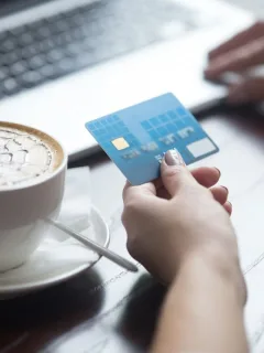 Someone holding a Chase Sapphire Preferred credit card.