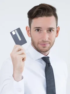 A man holding his Citi Premier Card.