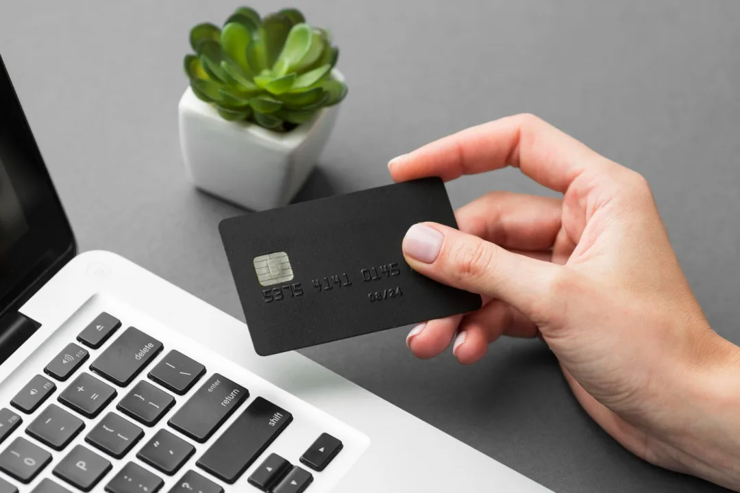 Someone holding a Aeroplan Credit Card.