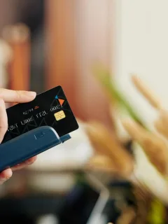 Someone using the Bilt Mastercard credit card.