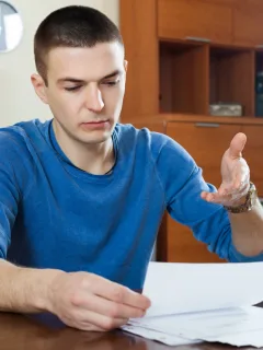 Man learning about Card Application Denied.
