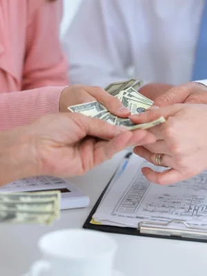 A person getting an Emergency Loan.