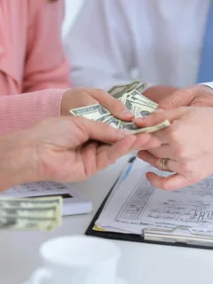 A person getting an Emergency Loan.