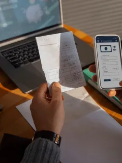 person resolves bank transactions through online banking