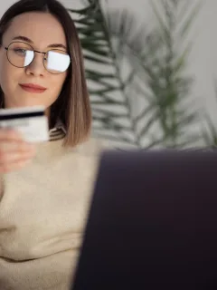 Woman checking her Balance Transfer Credit Card.