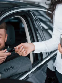 A man buying a car after getting a Auto Loan.