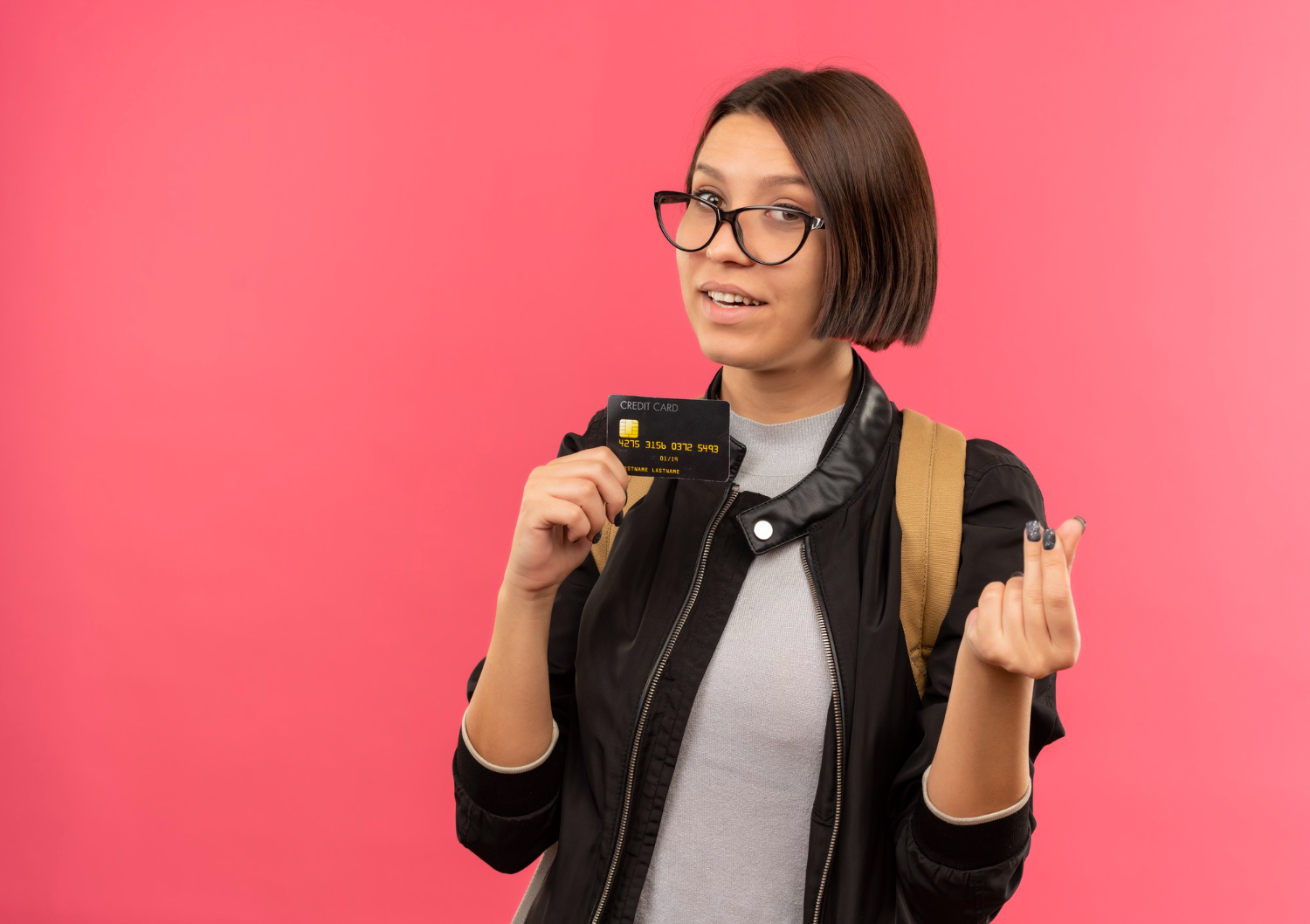 A girl holding her Citi Diamond Preferred.