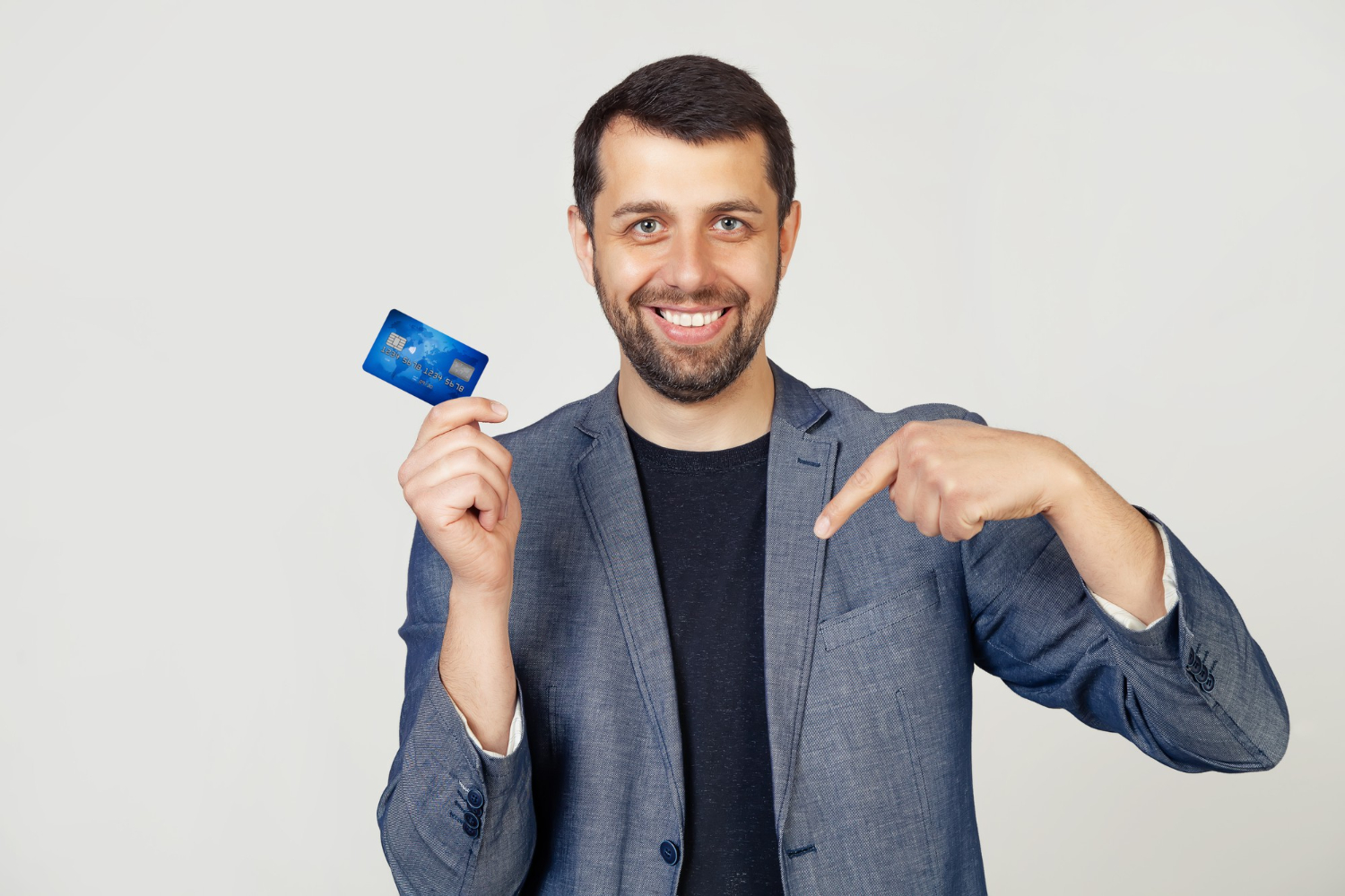 A guy holding his Discover it Balance Transfer.