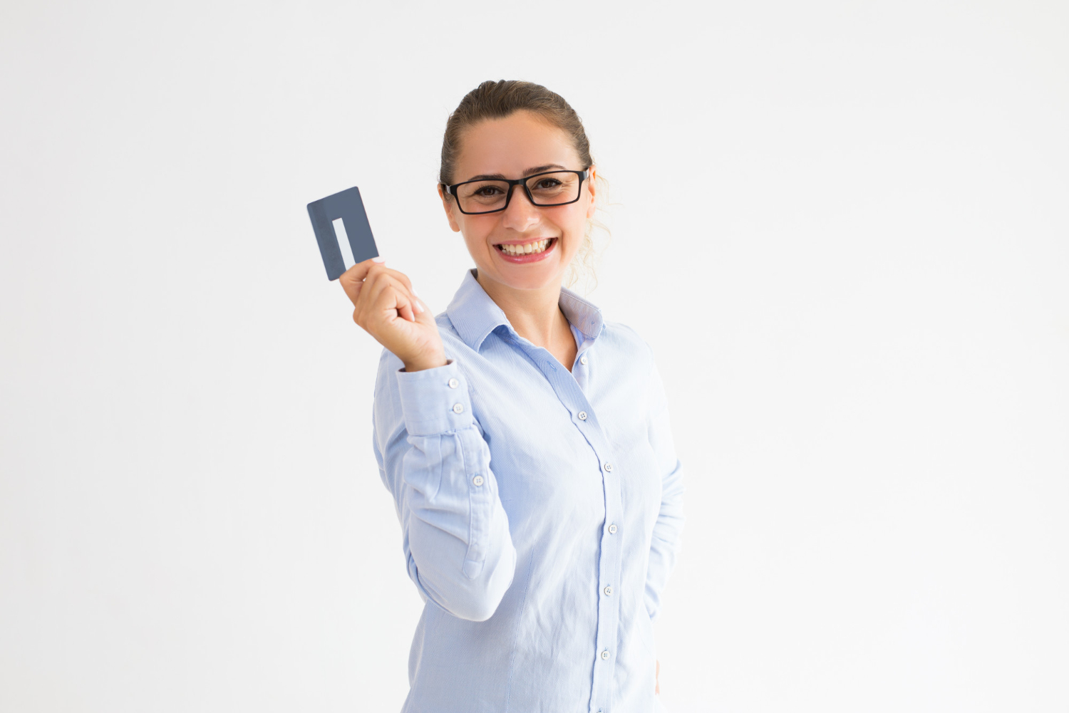 A woman holding her Discover it Cash Back.