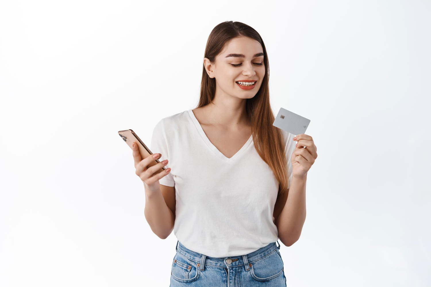 A woman holding her Mission Lane Visa.