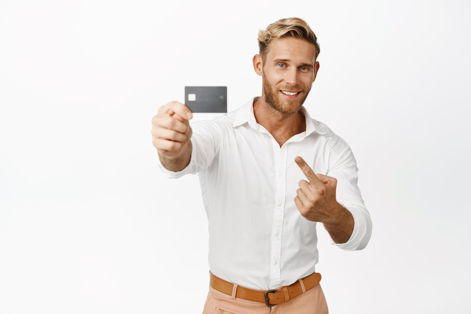 A guy holding a CareCredit card.