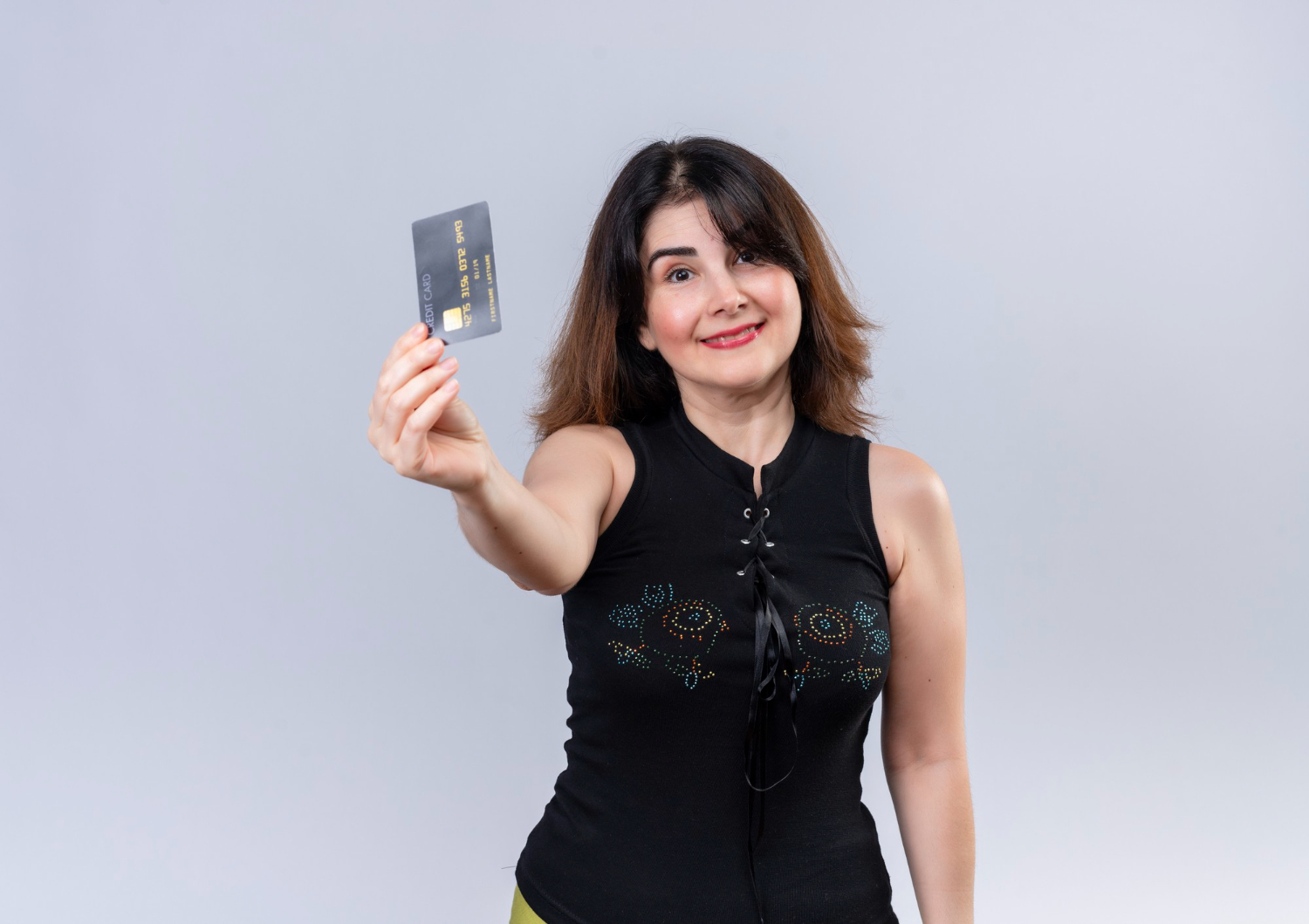 A woman using her CareCredit Card.