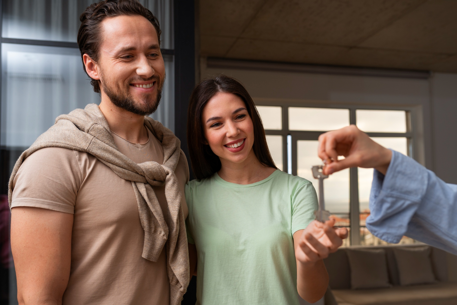 couple takes the keys to the mortgage