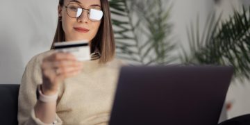 Woman checking her Balance Transfer Credit Card.